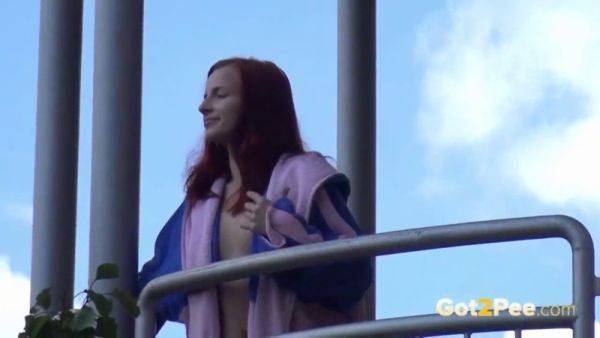Watch this kinky redhead get a public surprise while peeing in the city - sexu.com on systemporn.com