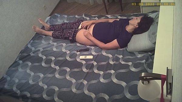 Slightly lowered her panties and jerks off her pussy without knowing about the hidden camera - hclips.com on systemporn.com