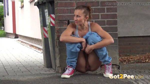 Lara Braun relieves herself in public with a walk and a pull - sexu.com on systemporn.com