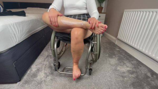 Wheelchair Girl Massaging Legs And Feet After Work - hclips.com on systemporn.com