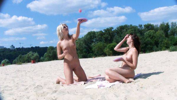 Hot nude beach girl is catching some rays while a camera perfectly films her from behind - hclips.com on systemporn.com