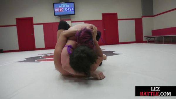 Wrestling Asian lez licks winner muscles after losing fight - hotmovs.com on systemporn.com