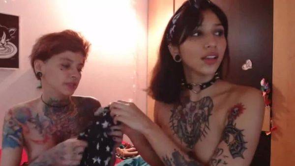 Two girls with tattoos show what they can do with hot pussy - anysex.com on systemporn.com