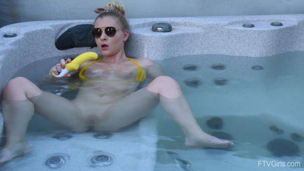 Sweet blonde inserts big dildo in her shaved pussy while in the pool - hellporno.com on systemporn.com